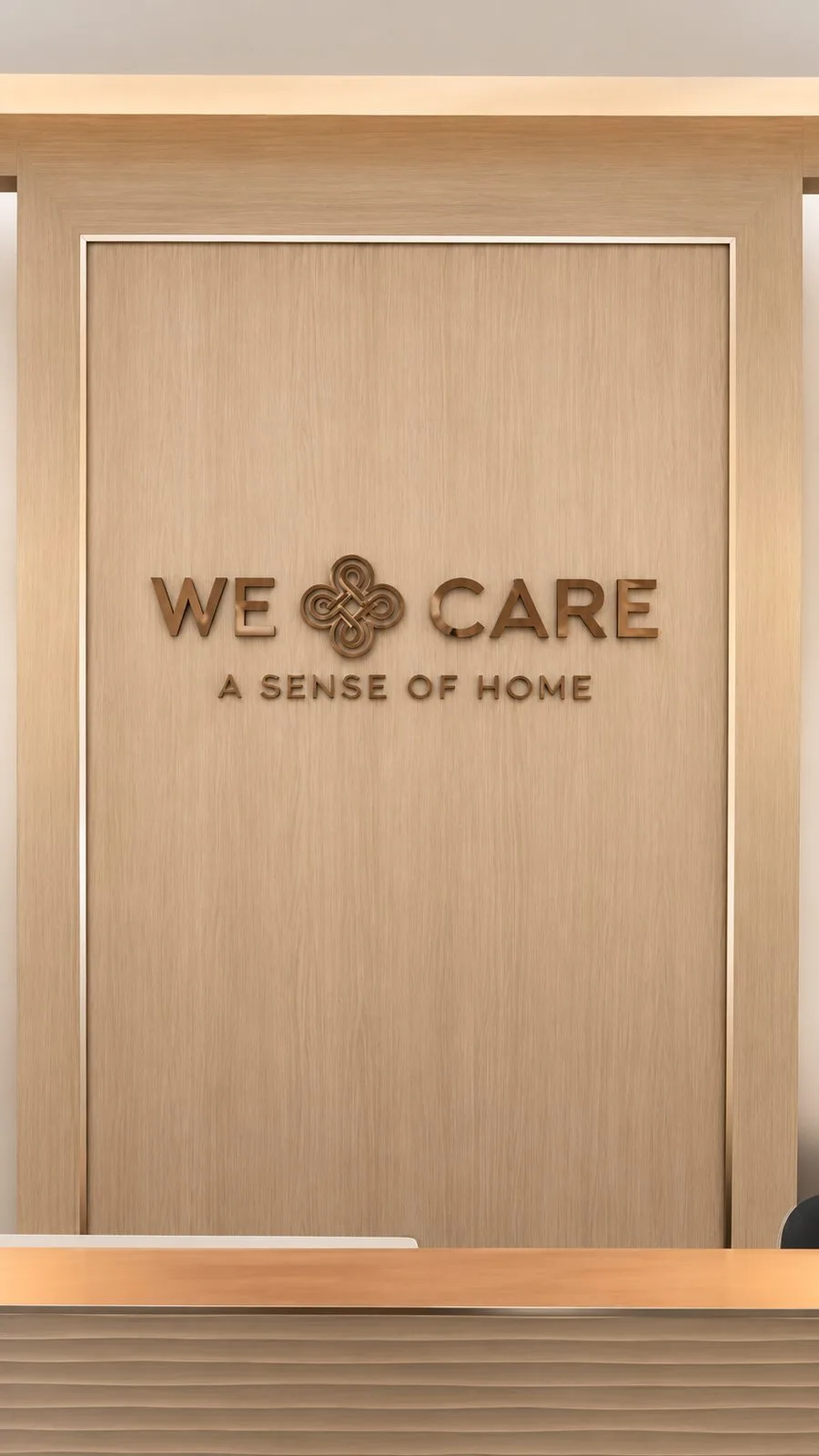 ป้ายโลโก้ We Care บนผนังไม้